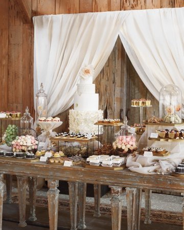 The dessert bar at Blake Lively and Ryan Reynolds's wedding included a wedding cake and an assortment of sweets.
Source: Guy Aroch/Martha Stewart Weddings
The dessert bar at Blake Lively and Ryan Reynolds's wedding included a wedding cake and an assortment of sweets.
Source: Guy Aroch/Martha Stewart Weddings