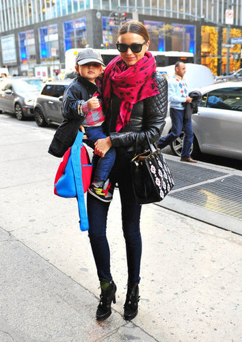 With son Flynn in hand, Miranda donned a mommy-on-the-go look with a Balenciaga quilted jacket, hot-pink pashmina, skinny jeans, Tabitha Simmons lace-up ankle boots, and a Prada bag adorned with floral appliqués.
With son Flynn in hand, Miranda donned a mommy-on-the-go look with a Balenciaga quilted jacket, hot-pink pashmina, skinny jeans, Tabitha Simmons lace-up ankle boots, and a Prada bag adorned with floral appliqués.