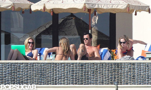 Jennifer Aniston Kisses Justin Poolside During a Bikini-Filled NYE Jennifer Aniston Kisses Justin Poolside During a Bikini-Filled NYE