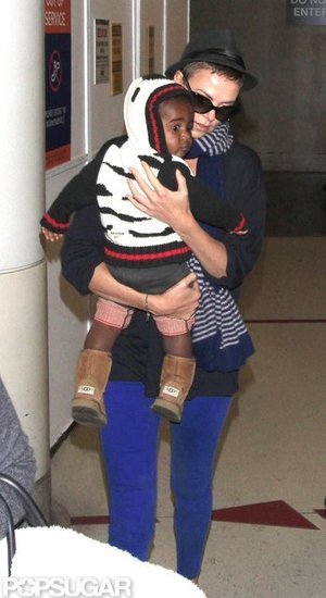 Charlize Theron carried Jackson Theron through the terminal. Charlize Theron carried Jackson Theron through the terminal.