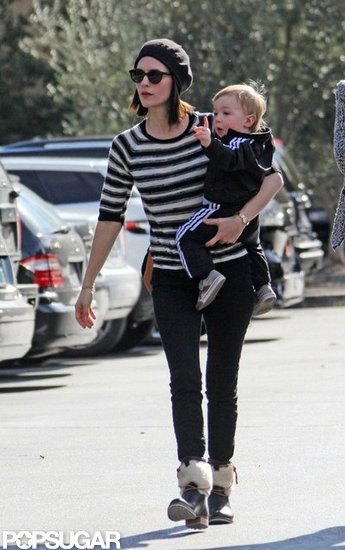 January Jones wore a striped shirt and hat for an outing with Xander on her hip.
January Jones wore a striped shirt and hat for an outing with Xander on her hip.