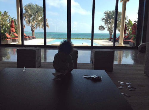 Jay-Z shared a vacation pic of 1-year-old Blue Ivy enjoying a game of Uno in the Bahamas.
Source: Life+Times
Jay-Z shared a vacation pic of 1-year-old Blue Ivy enjoying a game of Uno in the Bahamas.
Source: Life+Times