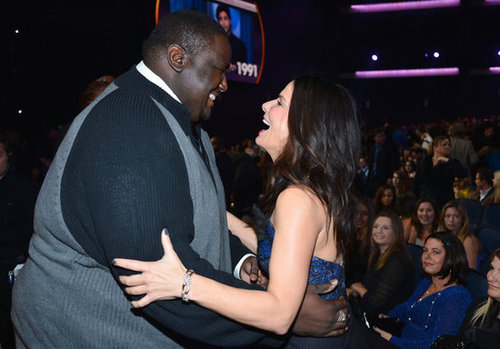 Sandra Bullock greeted her Blind Side costar Quinton Aaron at the People's Choice Awards.
Sandra Bullock greeted her Blind Side costar Quinton Aaron at the People's Choice Awards.