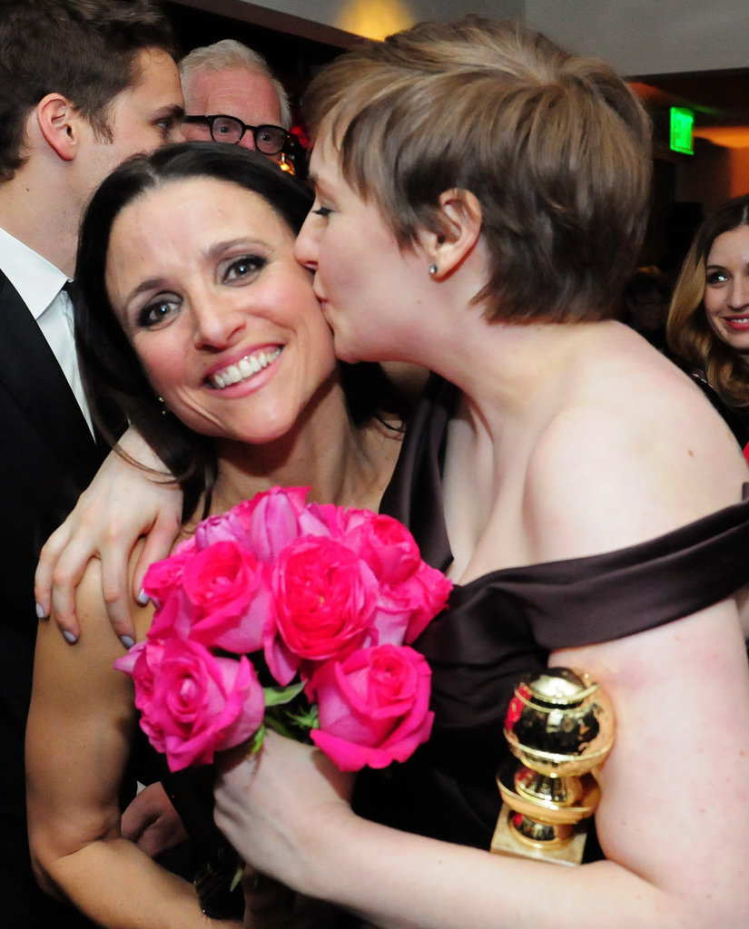 Lena Dunham kissed her fellow Golden Globe Award nominee Julia Louis-Dreyfus at HBO's Globes afterparty.
Lena Dunham kissed her fellow Golden Globe Award nominee Julia Louis-Dreyfus at HBO's Globes afterparty.