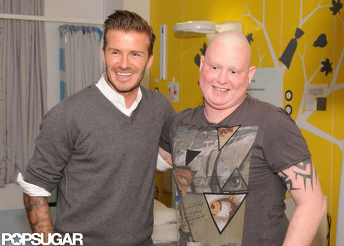 David Beckham took photos with cancer patients at Queen Elizabeth Hospital.
David Beckham took photos with cancer patients at Queen Elizabeth Hospital.