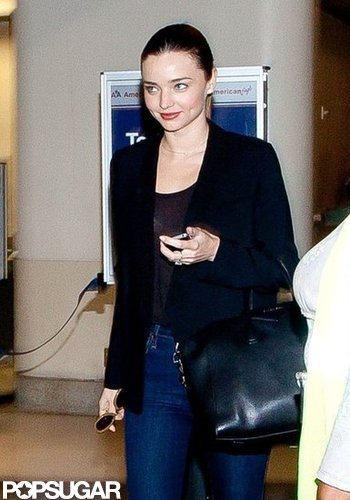 Miranda Kerr carried a black leather bag.
Miranda Kerr carried a black leather bag.
