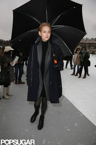 Leelee Sobieski arrived in style under a black umbrella.
Leelee Sobieski arrived in style under a black umbrella.