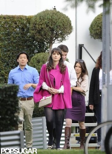 Zooey Deschanel Gets Sporty in Stripes on the Set of New Girl Zooey Deschanel Gets Sporty in Stripes on the Set of New Girl