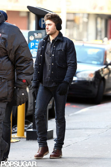 Zac Efron filmed while wearing earmuffs in NYC. Zac Efron filmed while wearing earmuffs in NYC.