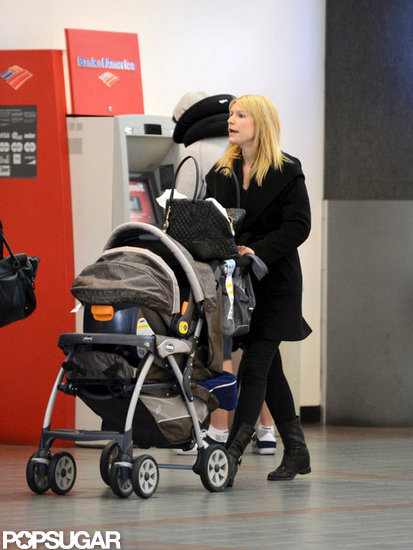 Claire Danes pushed Cyrus Dancy in his stroller as the pair traveled out of LAX. Claire Danes pushed Cyrus Dancy in his stroller as the pair traveled out of LAX.