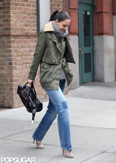 Katie Holmes wore patchwork jeans and a green jacket.
Katie Holmes wore patchwork jeans and a green jacket.