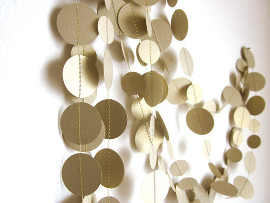Hanging gold garland ($18) adds a festive touch. Make it extra holiday-friendly by pairing it with red accents.
Hanging gold garland ($18) adds a festive touch. Make it extra holiday-friendly by pairing it with red accents.