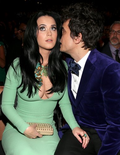 John Mayer whispered in girlfriend Katy Perry's ear during the Grammys show in LA.
John Mayer whispered in girlfriend Katy Perry's ear during the Grammys show in LA.