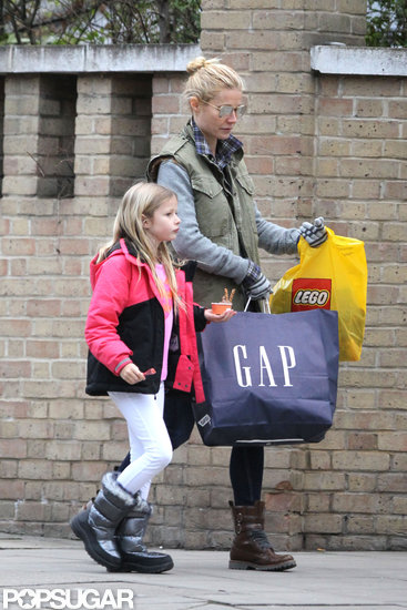 Gwyneth Paltrow carried a GAP bag as she shopped around London with Apple Martin.
Gwyneth Paltrow carried a GAP bag as she shopped around London with Apple Martin.