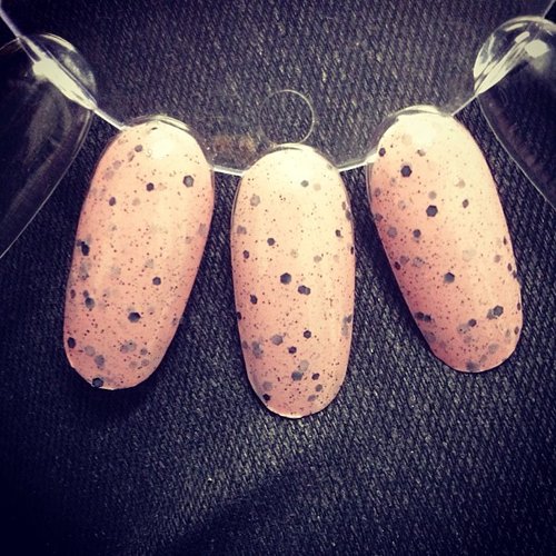 The pink speckled nail polish from Illamasqua's Spring line was inspired by this question: "What if Hello Kitty laid an egg?"
The pink speckled nail polish from Illamasqua's Spring line was inspired by this question: "What if Hello Kitty laid an egg?"