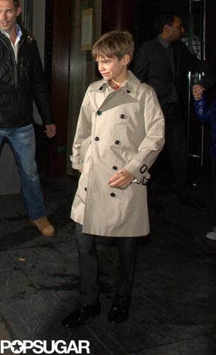 Romeo Beckham looked adorable in a beige trench coat Friday in London.
Romeo Beckham looked adorable in a beige trench coat Friday in London.
