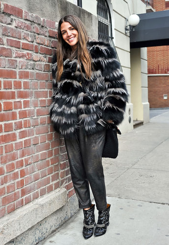 A striped fur chubby topped off slouchy trousers and embellished booties for that Kate Moss brand of downtown styling.
A striped fur chubby topped off slouchy trousers and embellished booties for that Kate Moss brand of downtown styling.