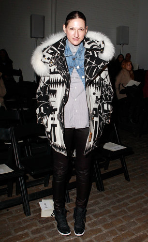 J.Crew's Jenna Lyons attended Yigal Azrouël's show looking extremely cozy in a black and white coat with a furry hood, which she layered over a denim jacket, a striped blouse, leather pants, and high-top sneakers.
J.Crew's Jenna Lyons attended Yigal Azrouël's show looking extremely cozy in a black and white coat with a furry hood, which she layered over a denim jacket, a striped blouse, leather pants, and high-top sneakers.