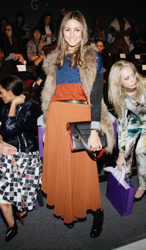 Olivia Palermo matched a burnt-orange maxi skirt with a sparkly sweater topped with a fur vest at the Noon by Noor show.
Olivia Palermo matched a burnt-orange maxi skirt with a sparkly sweater topped with a fur vest at the Noon by Noor show.