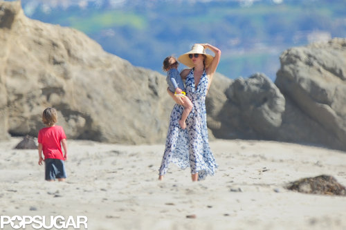 Miranda Kerr held Flynn in her arms on the beach in LA.
Miranda Kerr held Flynn in her arms on the beach in LA.