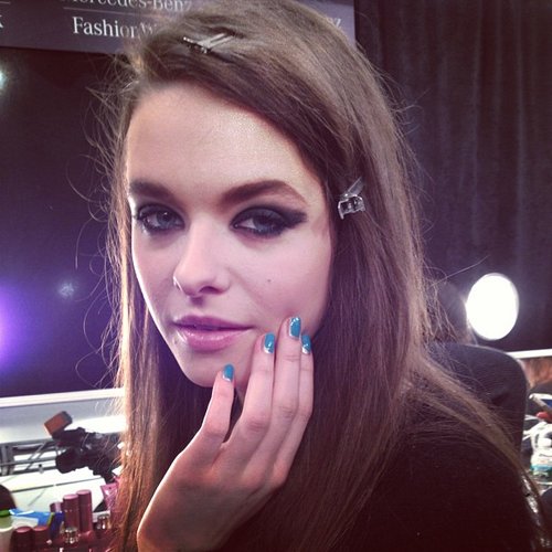 A smudged smoky eye created a next-day makeup look backstage at Tracy Reese.
A smudged smoky eye created a next-day makeup look backstage at Tracy Reese.