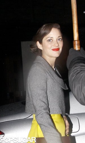 Marion Cotillard flashed a smile.
Marion Cotillard flashed a smile.
