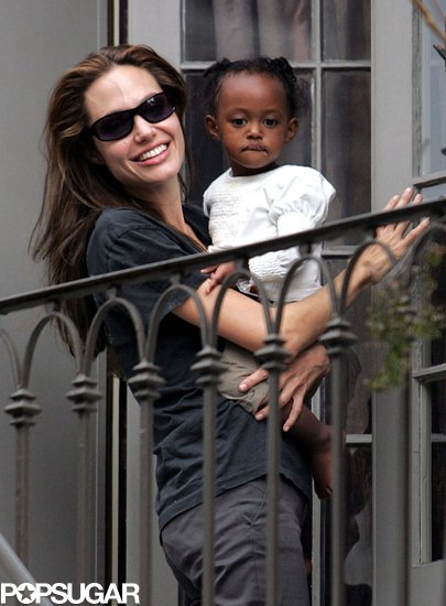 Angelina Jolie brought Zahara onto the balcony of their New Orleans home to watch the 2007 Mardi Gras crowd.
Angelina Jolie brought Zahara onto the balcony of their New Orleans home to watch the 2007 Mardi Gras crowd.