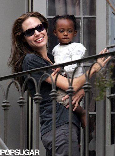 Angelina Jolie brought Zahara onto the balcony of their New Orleans home to watch the 2007 Mardi Gras crowd.
Angelina Jolie brought Zahara onto the balcony of their New Orleans home to watch the 2007 Mardi Gras crowd.