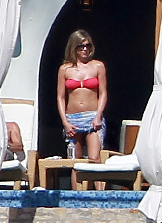 Jennifer Aniston wore a red bandeau bikini while spending Christmas in Cabo in December 2012.
Jennifer Aniston wore a red bandeau bikini while spending Christmas in Cabo in December 2012.