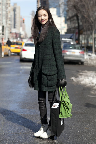 A plaid coat gave leather leggings a charming twist.
A plaid coat gave leather leggings a charming twist.