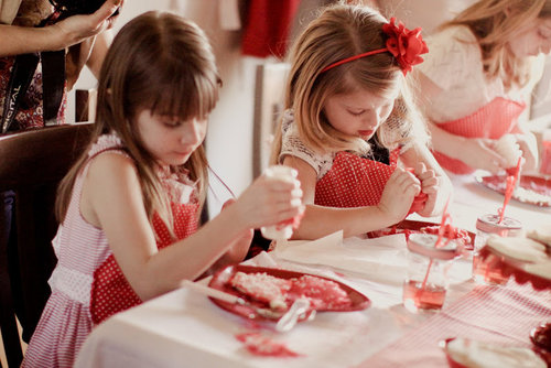 The girls wore red aprons to keep from getting messy during the fun cookie decorating.
Source: Jenny Cookies
The girls wore red aprons to keep from getting messy during the fun cookie decorating.
Source: Jenny Cookies