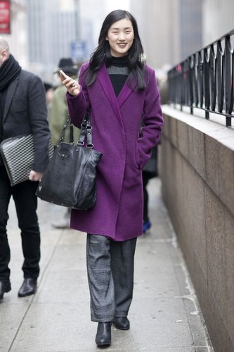 The best accessory for a bright purple jacket? A similarly shaded lipstick, like this woman showcased.
The best accessory for a bright purple jacket? A similarly shaded lipstick, like this woman showcased.