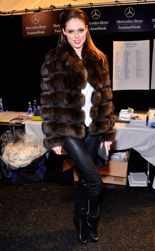 At Dennis Basso, Coco Rocha proved that brown and black are no longer fashion enemies. The model paired a plush chocolate fur coat with slick black leather pants and matching boots.
At Dennis Basso, Coco Rocha proved that brown and black are no longer fashion enemies. The model paired a plush chocolate fur coat with slick black leather pants and matching boots.