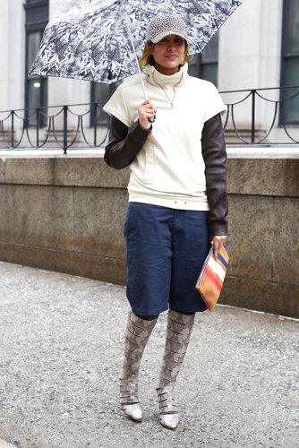 Sporty layers get a high-fashion complement with knee-high Wang boots.
Sporty layers get a high-fashion complement with knee-high Wang boots.