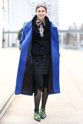 A gorgeous wash of color on her coat and a pop of print on her blouse brightened up her Winter staples.
A gorgeous wash of color on her coat and a pop of print on her blouse brightened up her Winter staples.
