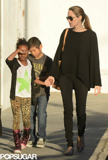 Angelina Jolie wore sunglasses to take her kids Zahara and Pax shopping in LA.
Angelina Jolie wore sunglasses to take her kids Zahara and Pax shopping in LA.