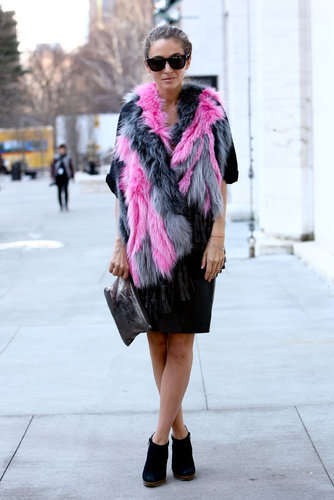 Bubble-gum-colored fur popped against a black skirt.
Bubble-gum-colored fur popped against a black skirt.