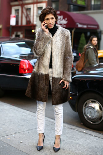 A two-toned fur lent a posh finish to staples, like a turtleneck knit and heels.
A two-toned fur lent a posh finish to staples, like a turtleneck knit and heels.