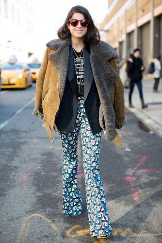 Leandra Medine gave her statement trousers a cozy fiinish with a luxe shearling and suede jacket.
Leandra Medine gave her statement trousers a cozy fiinish with a luxe shearling and suede jacket.