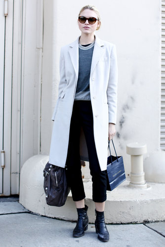 Cropped trousers were just the right length to show off this show-goer's ankle boots.
Cropped trousers were just the right length to show off this show-goer's ankle boots.