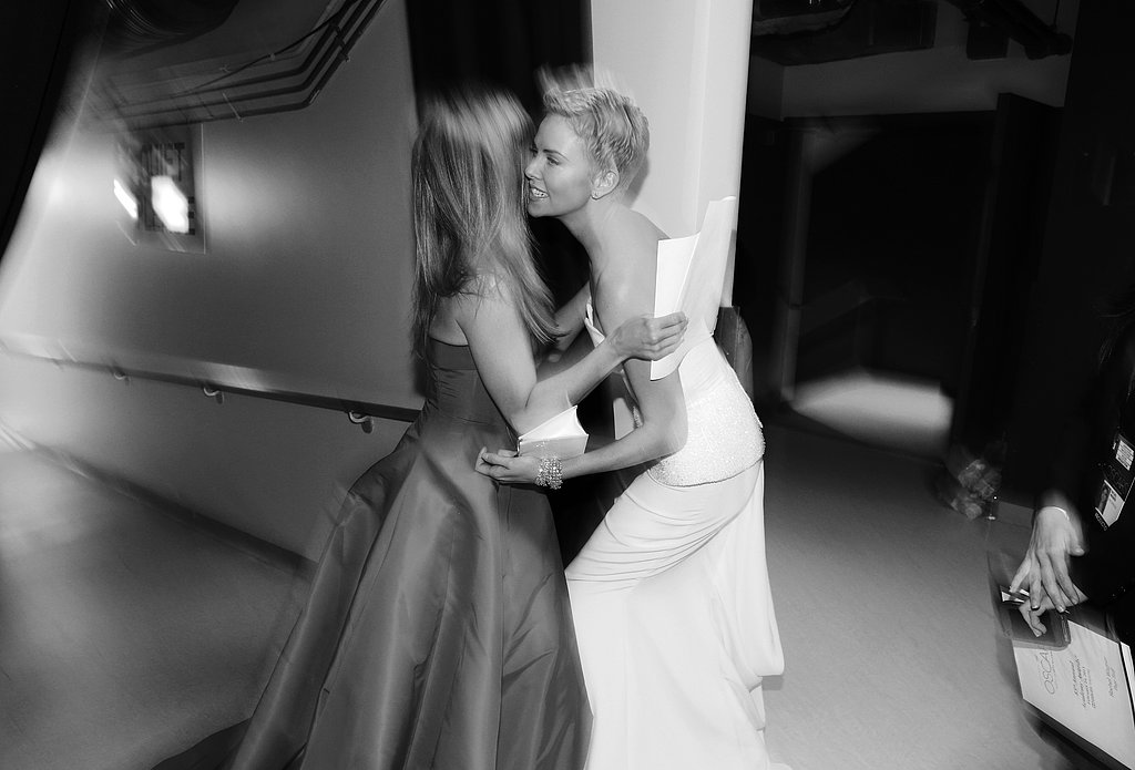 Jennifer Aniston and Charlize Theron backstage at the 2013 Oscars.
Jennifer Aniston and Charlize Theron backstage at the 2013 Oscars.