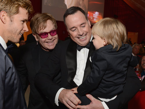Elton John and David Furnish doted over their son Zachary at their Oscar party in LA.
Elton John and David Furnish doted over their son Zachary at their Oscar party in LA.
