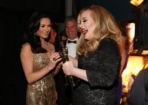 Catherine Zeta-Jones, Paul Epworth, and Adele gathered backstage at the Oscars.
Catherine Zeta-Jones, Paul Epworth, and Adele gathered backstage at the Oscars.