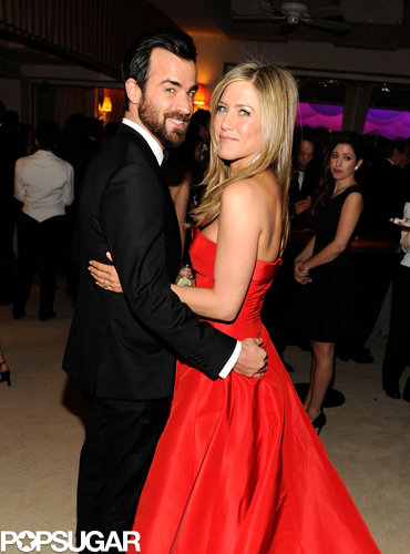 Justin Theroux and Jennifer Aniston cuddled up inside the Vanity Fair Oscar party on Sunday night after the award show.
Justin Theroux and Jennifer Aniston cuddled up inside the Vanity Fair Oscar party on Sunday night after the award show.