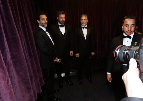 Grant Heslov, Ben Affleck, and George Clooney backstage at the 2013 Oscars.
Grant Heslov, Ben Affleck, and George Clooney backstage at the 2013 Oscars.