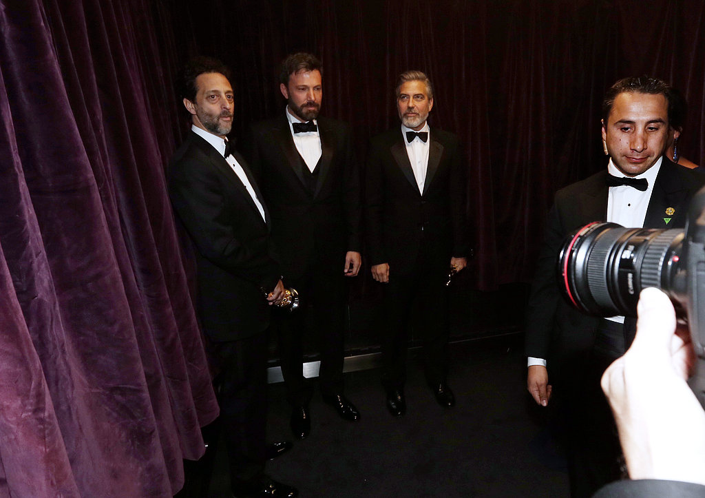 Grant Heslov, Ben Affleck, and George Clooney backstage at the 2013 Oscars.
Grant Heslov, Ben Affleck, and George Clooney backstage at the 2013 Oscars.