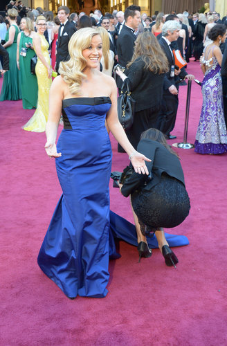 Reese Witherspoon waited for the perfect moment to pose in her Louis Vuitton gown.
Reese Witherspoon waited for the perfect moment to pose in her Louis Vuitton gown.