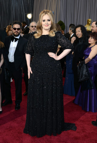Adele on the red carpet at the Oscars 2013.
Adele on the red carpet at the Oscars 2013.
