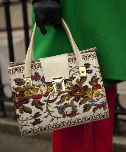 We love the floral tapestry detailing on this structured satchel bag.
We love the floral tapestry detailing on this structured satchel bag.