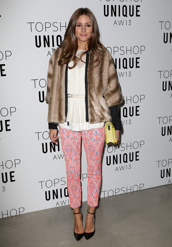 At the Unique Topshop show in London, Olivia brightened her ombré coat with punchy paisley Topshop pants and a yellow clutch.
At the Unique Topshop show in London, Olivia brightened her ombré coat with punchy paisley Topshop pants and a yellow clutch.